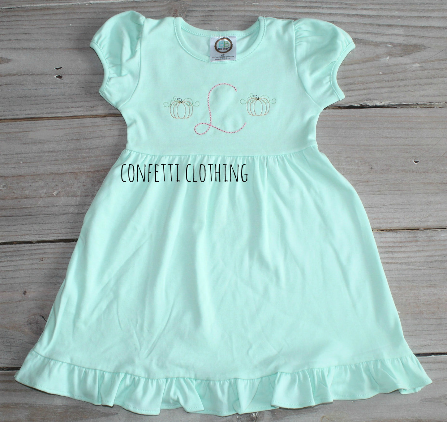 Sketch Girls Pumpkin Monogram Design on a Dress